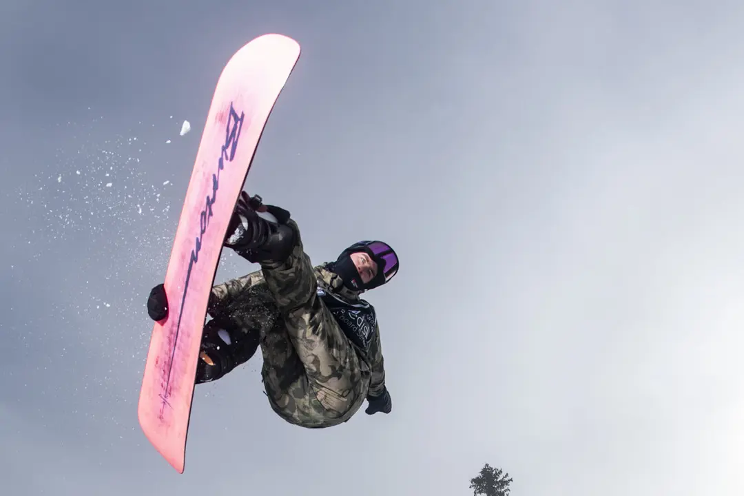 Swedish Championships in Kläppen Snowpark a snowboarder performs tricks in the air